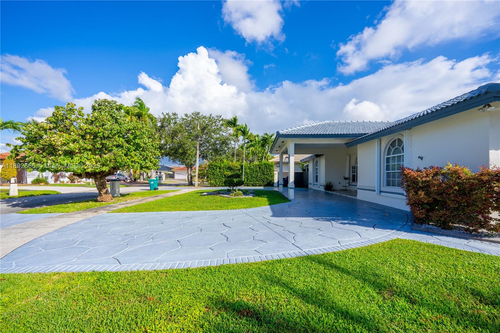 2275 Southwest 143rd Court Miami, FL 33175 - Photo 13 of 64 a view of a house with a swimming pool and a yard