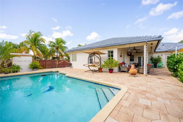 a living room with a couch and a flat screen tv