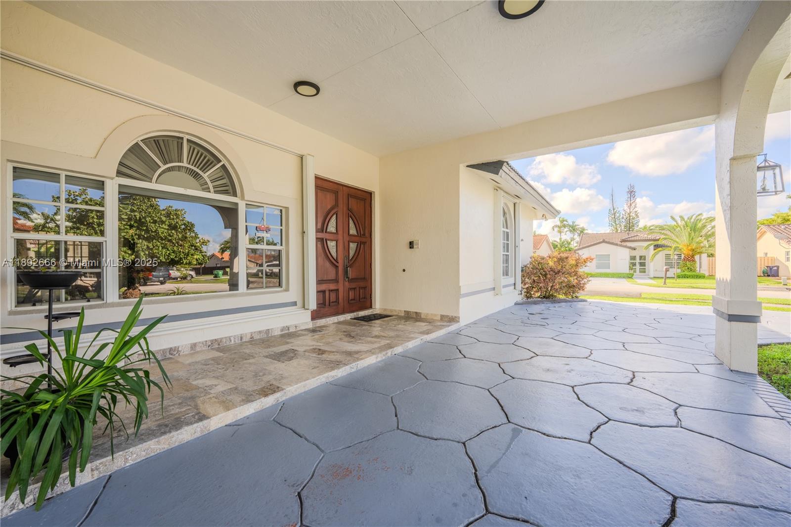 2275 Southwest 143rd Court Miami, FL 33175 - Photo 24 of 64 a view of a entryway door of the house