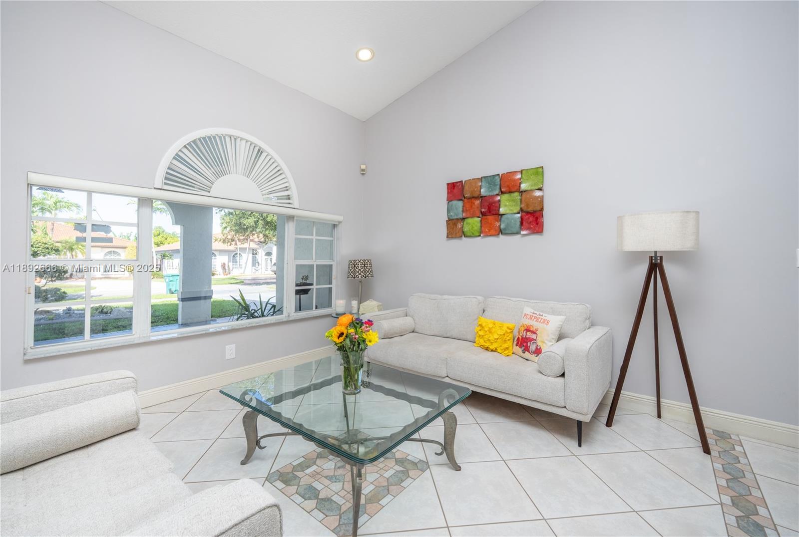 2275 Southwest 143rd Court Miami, FL 33175 - Photo 29 of 64 a living room with furniture and a large window