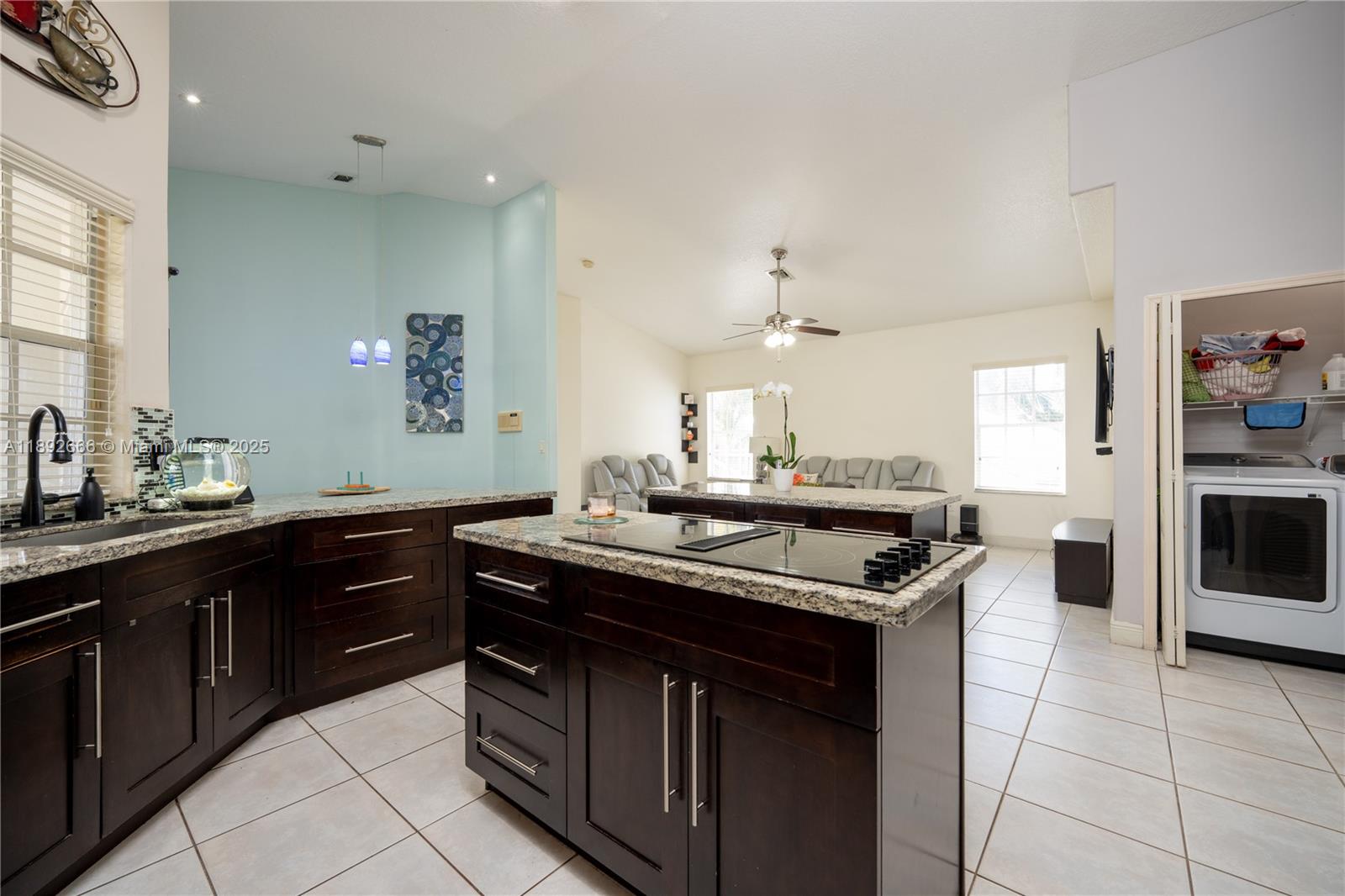 2275 Southwest 143rd Court Miami, FL 33175 - Photo 33 of 64 a kitchen with a sink and cabinets