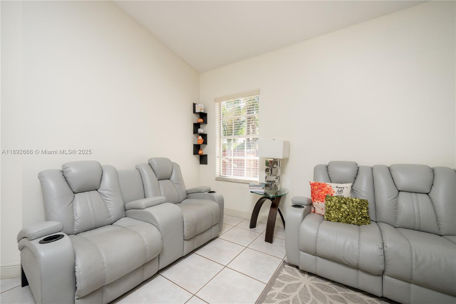 2275 Southwest 143rd Court Miami, FL 33175 - Photo 39 of 64 a living room with furniture and a couch