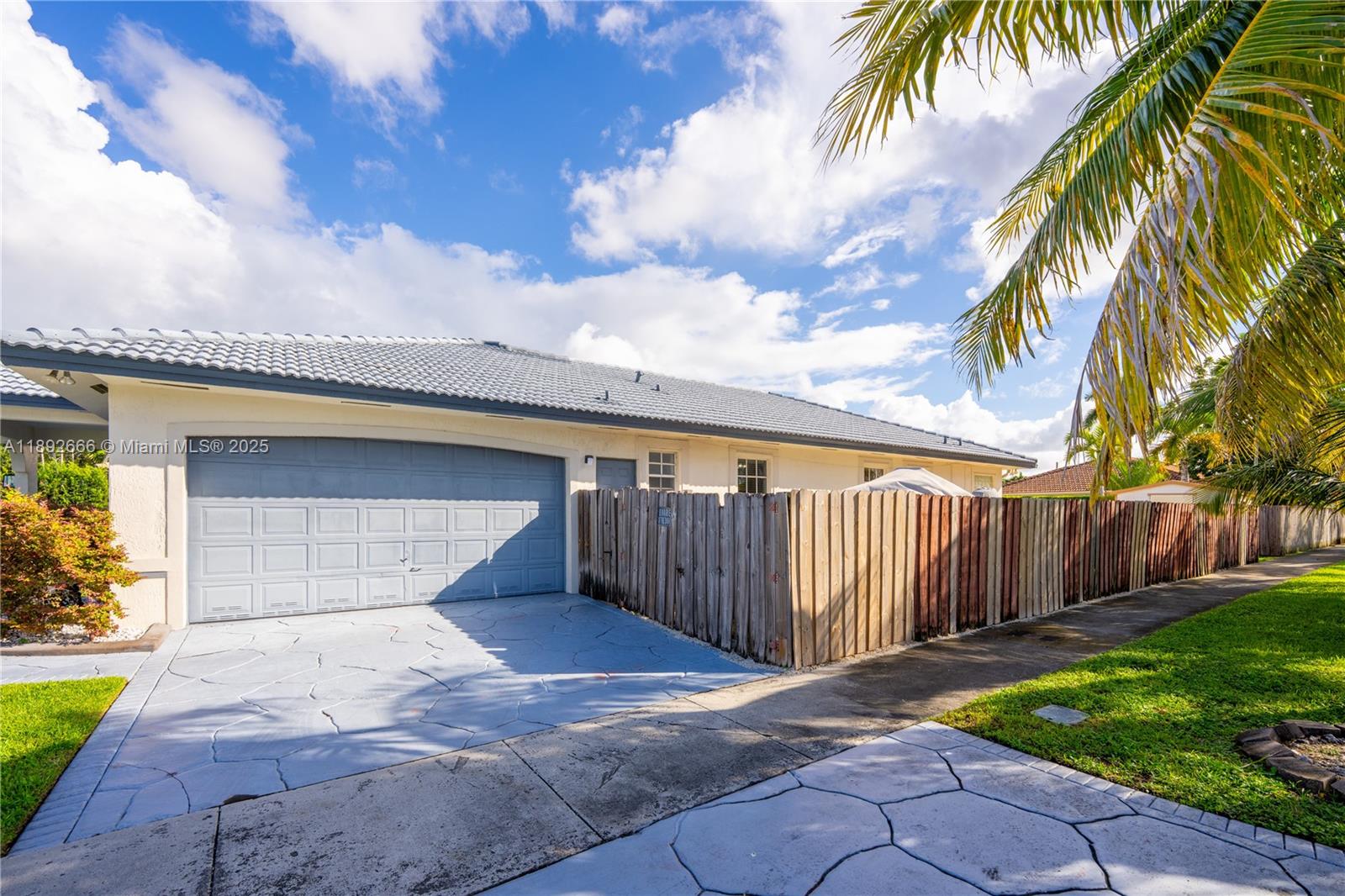2275 Southwest 143rd Court Miami, FL 33175 - Photo 40 of 64 a backyard of a house with lots of green space