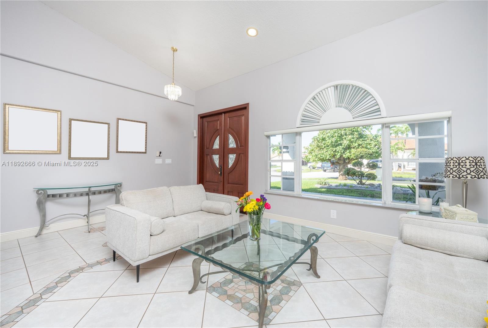 2275 Southwest 143rd Court Miami, FL 33175 - Photo 41 of 64 a living room with furniture and a large window