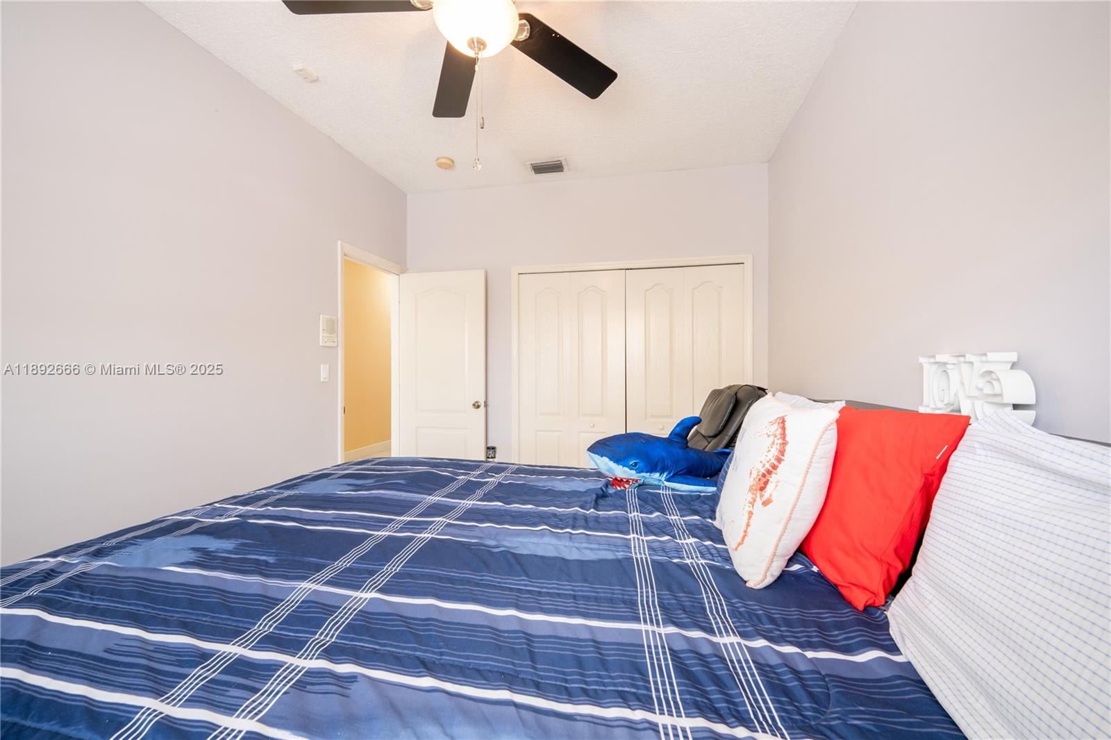 2275 Southwest 143rd Court Miami, FL 33175 - Photo 43 of 64 a bedroom with a bed and wooden floor