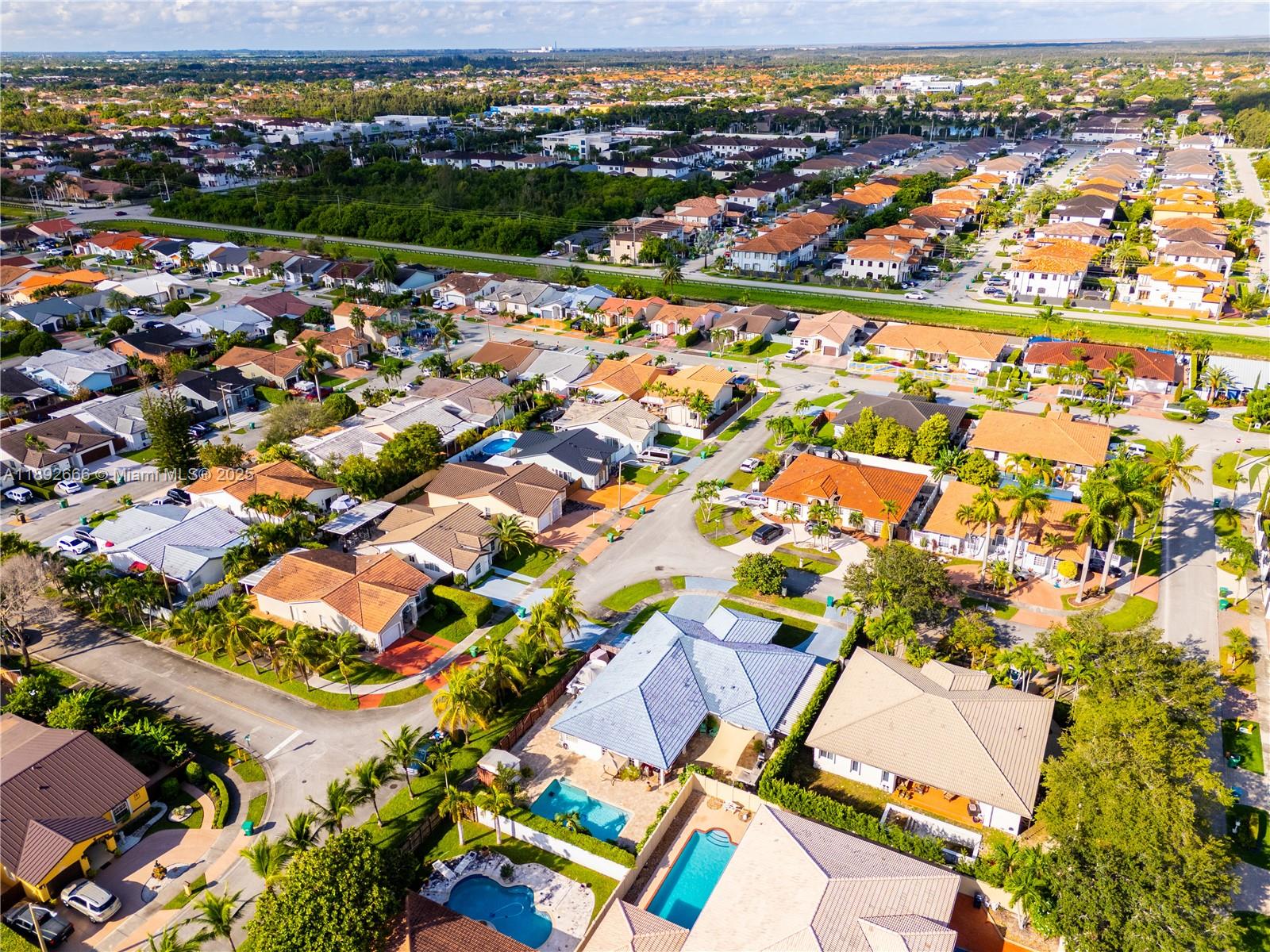 2275 Southwest 143rd Court Miami, FL 33175 - Photo 64 of 64 an aerial view of residential houses with outdoor space