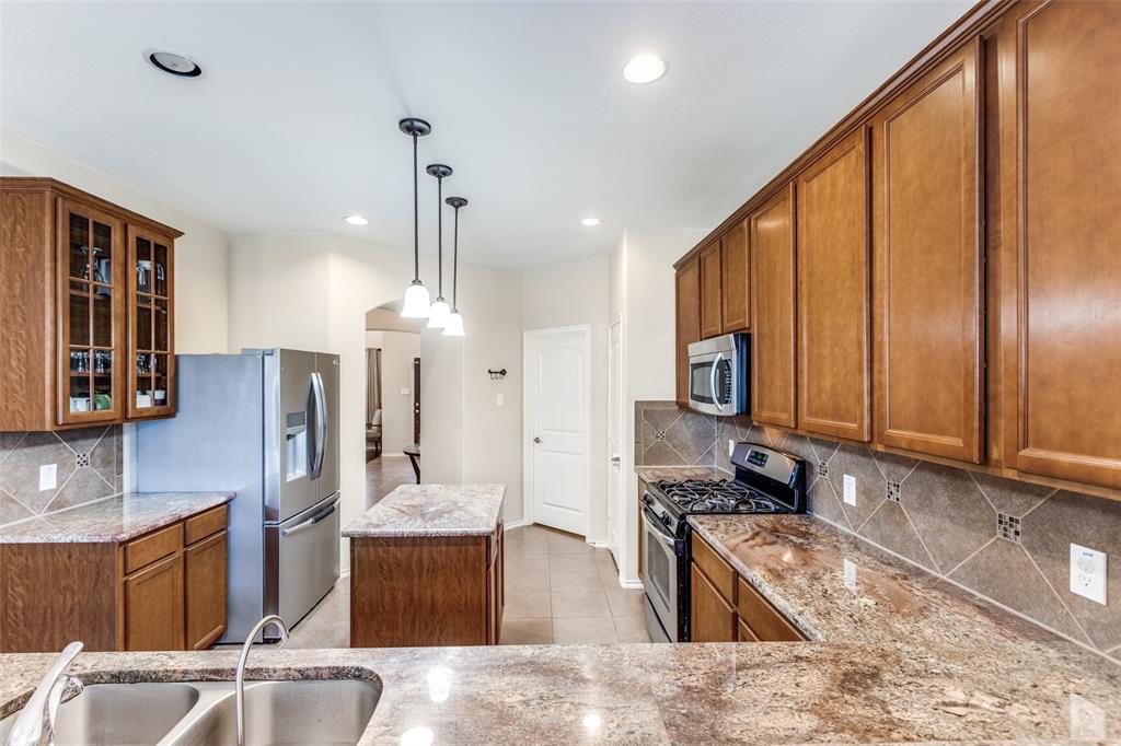 3602 Spring Run Lane Melissa, TX 75454 - Photo 12 of 29 Utility room and Garage connected to kitchen