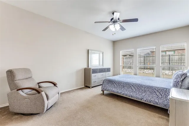 a bathroom with a double vanity sink and mirror