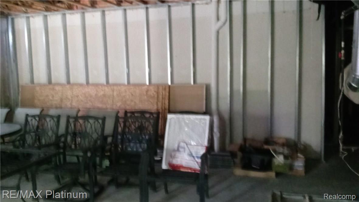 4120 Merriman Loop Howell, MI 48843 - Photo 26 of 34 Walkout basement has some framing and SELLER WILL LEAVE MATERIALS