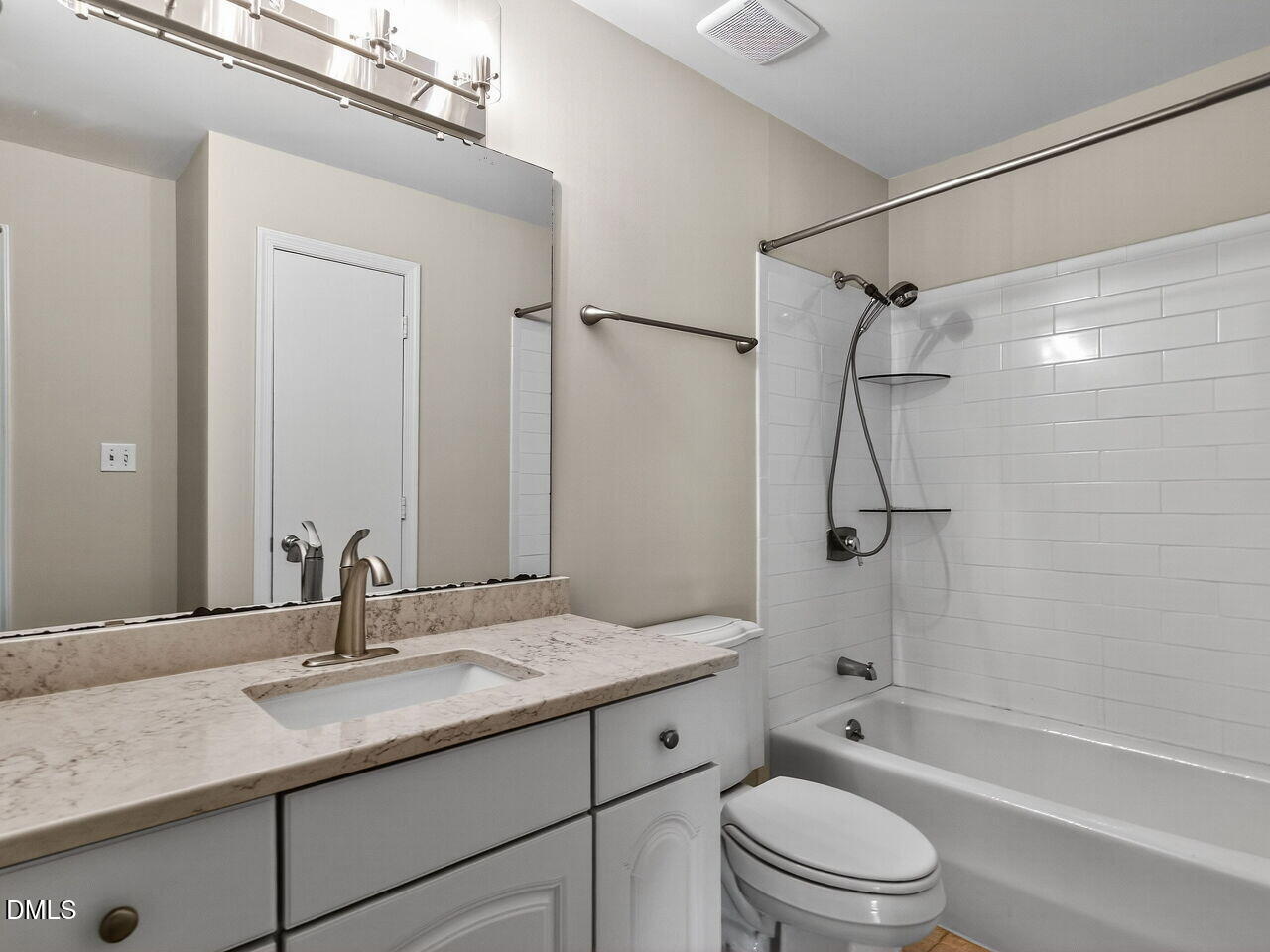 911 Washington Street, Unit 203 Raleigh, NC 27605 - Photo 9 of 30 Hall bathroom with linen closet