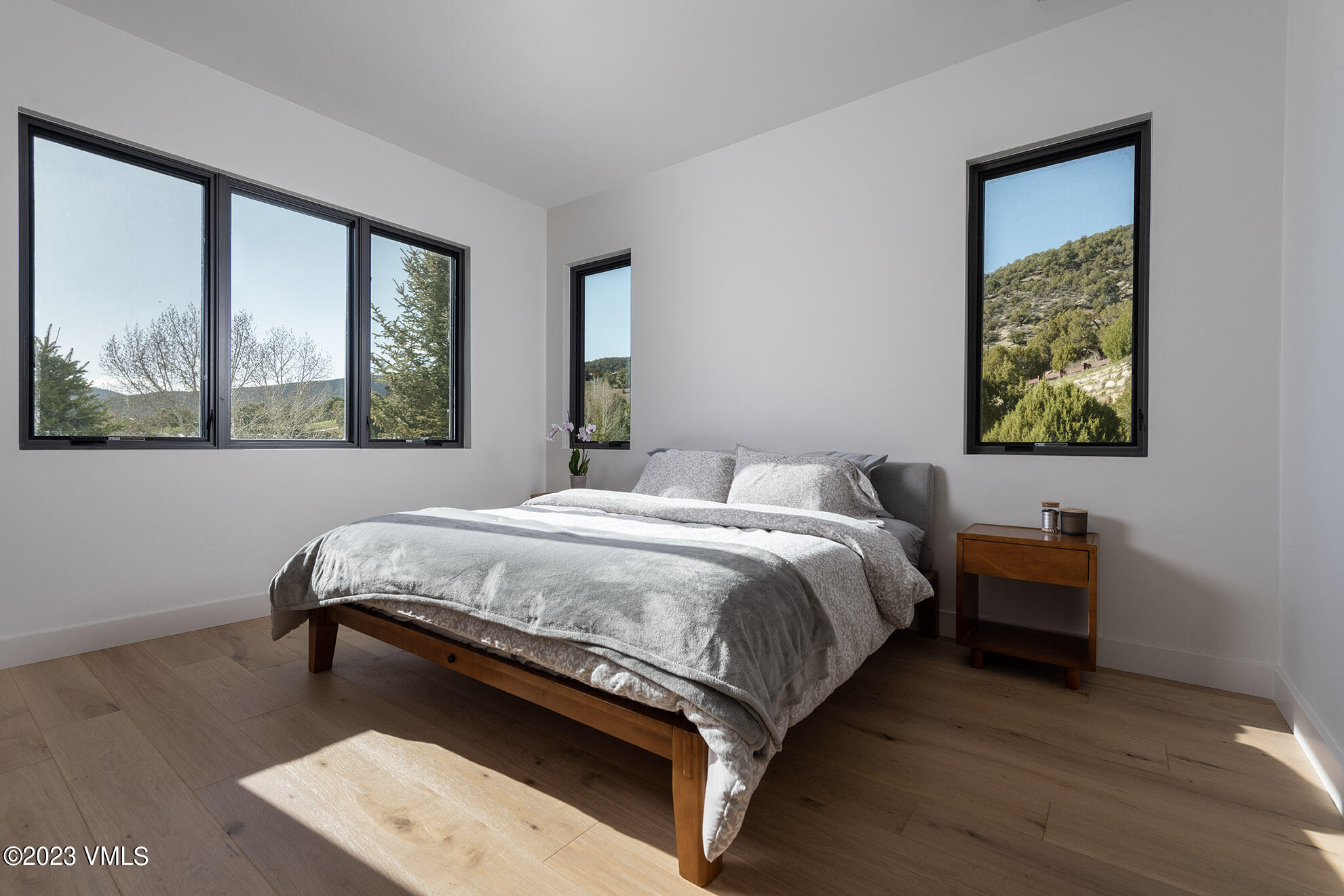 118 Juniper Ridge Road Edwards, CO 81632 - Photo 12 of 16 a bed sitting in a bedroom next to a window