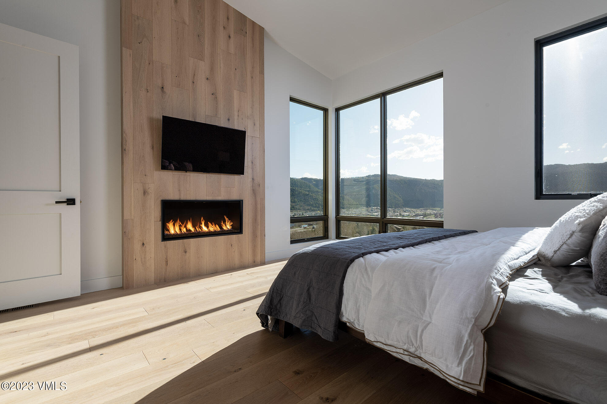 118 Juniper Ridge Road Edwards, CO 81632 - Photo 4 of 16 a bedroom with a bed and a fireplace