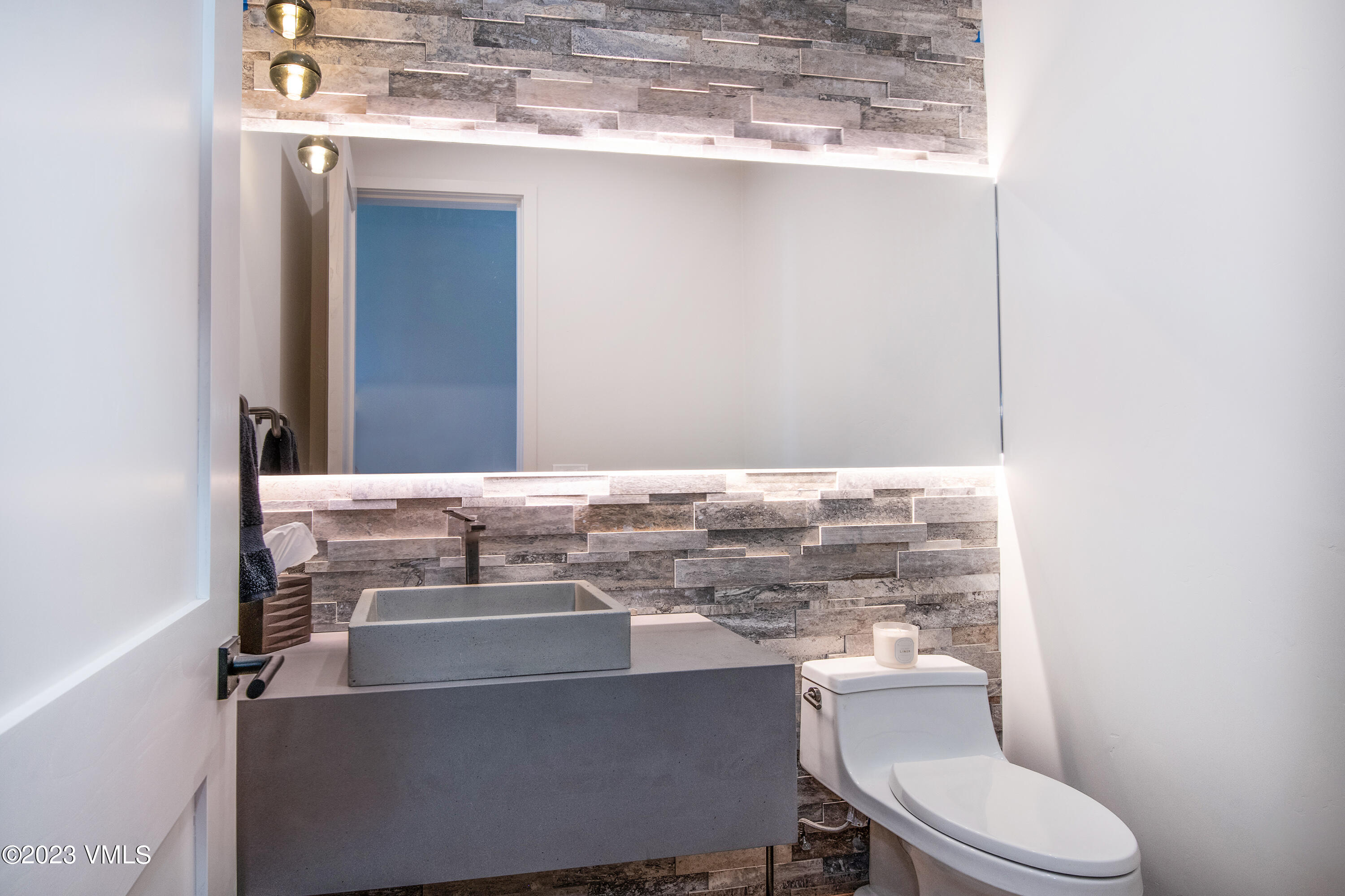 118 Juniper Ridge Road Edwards, CO 81632 - Photo 6 of 16 a bathroom with a sink toilet and mirror