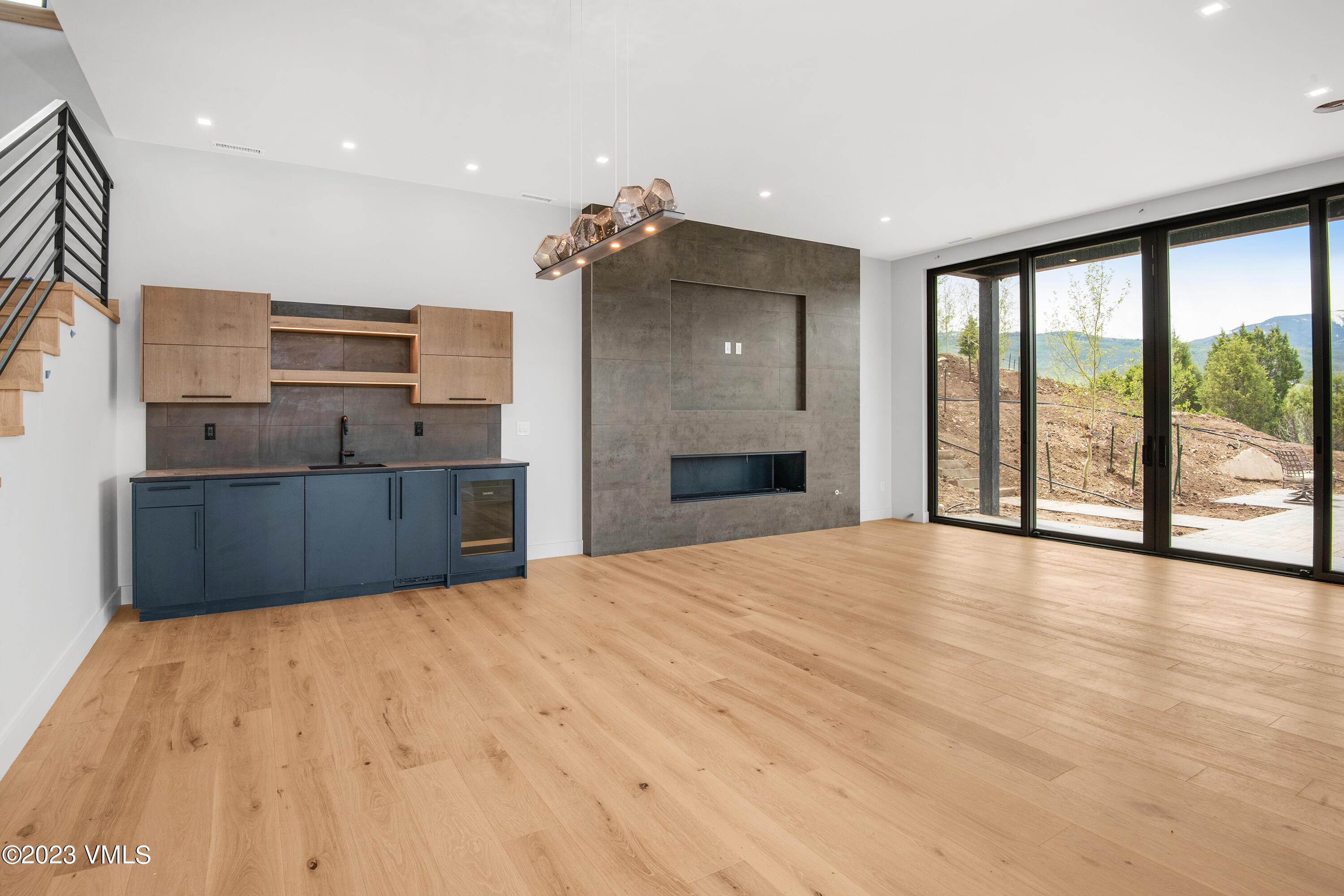 118 Juniper Ridge Road Edwards, CO 81632 - Photo 8 of 16 a large kitchen with kitchen island a sink stainless steel appliances and cabinets