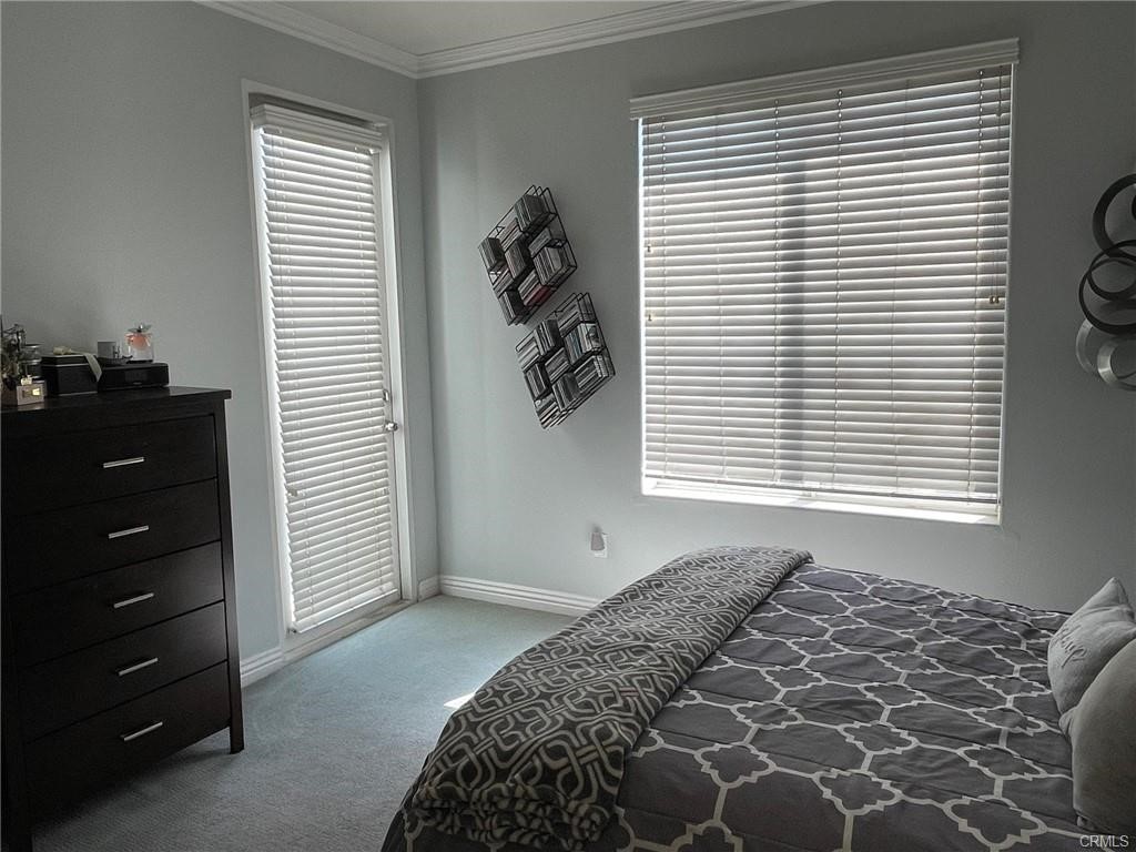 2233 Martin, Unit 413 Irvine, CA 92612 - Photo 27 of 45 a bedroom with a bed and a window