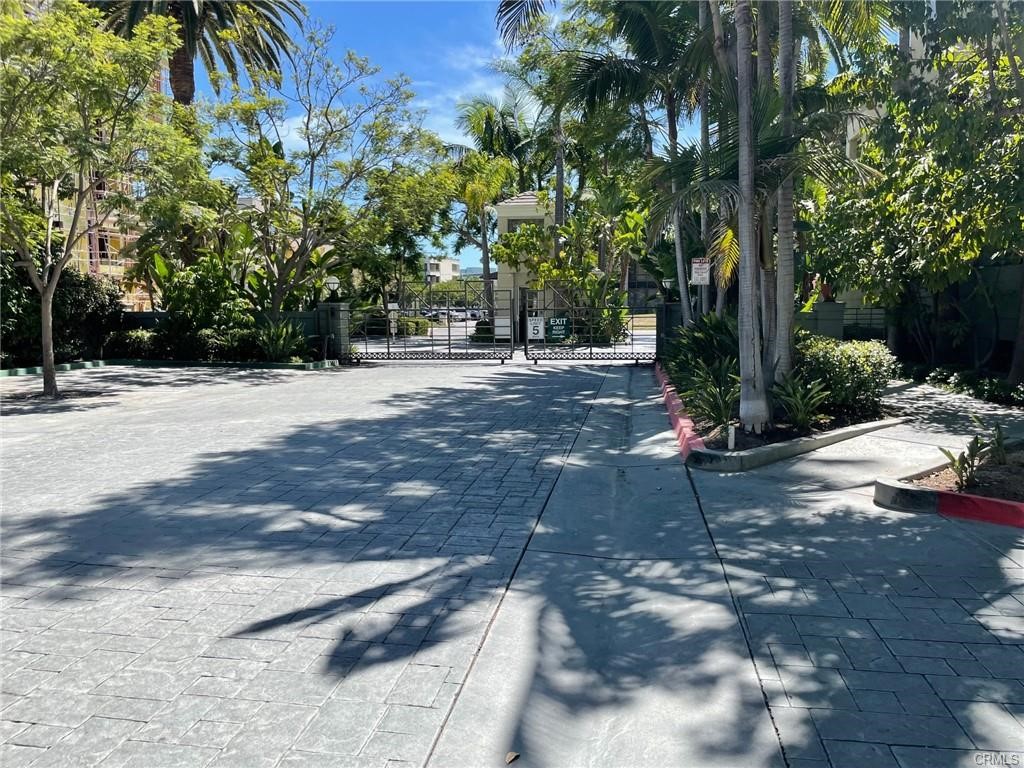 2233 Martin, Unit 413 Irvine, CA 92612 - Photo 4 of 45 a view of a street with a tree