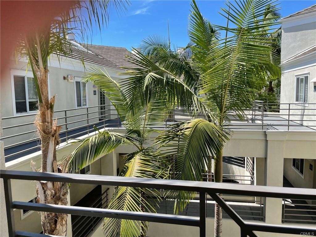 2233 Martin, Unit 413 Irvine, CA 92612 - Photo 10 of 45 a view of a house and a balcony
