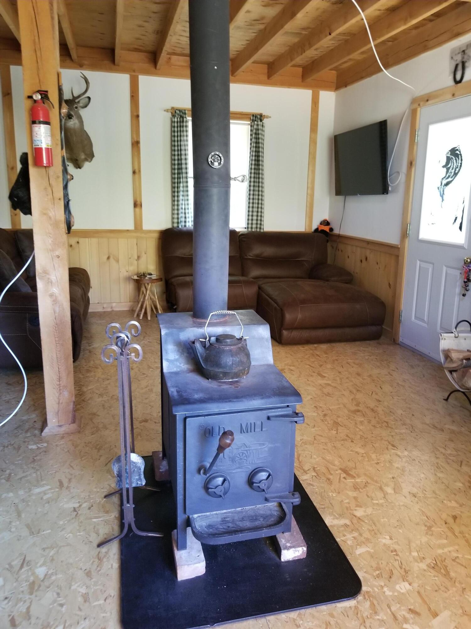 195 Sawyers Mills Road Starks, ME 04911 - Photo 20 of 33 Woodstove