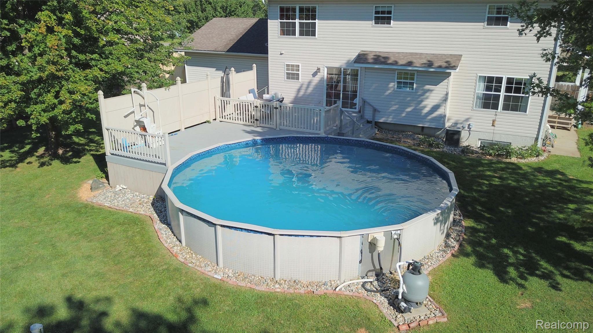 6507 Carpenter Road Flushing, MI 48433 - Photo 20 of 25 Deck and Pool.JPG