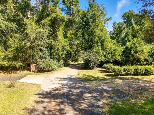 a picture of a bench in front of a building