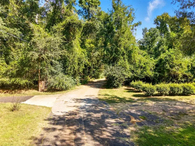a picture of a bench in front of a building