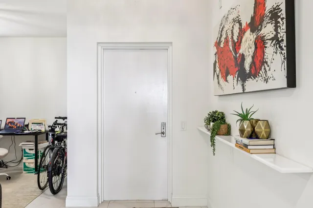 a room with furniture and gym equipment