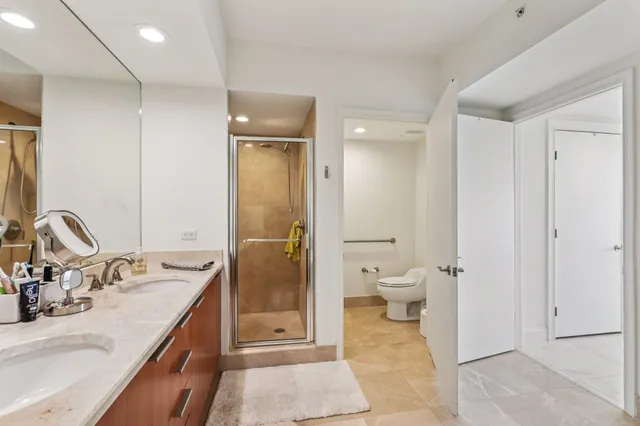 a terrace with outdoor seating and city view