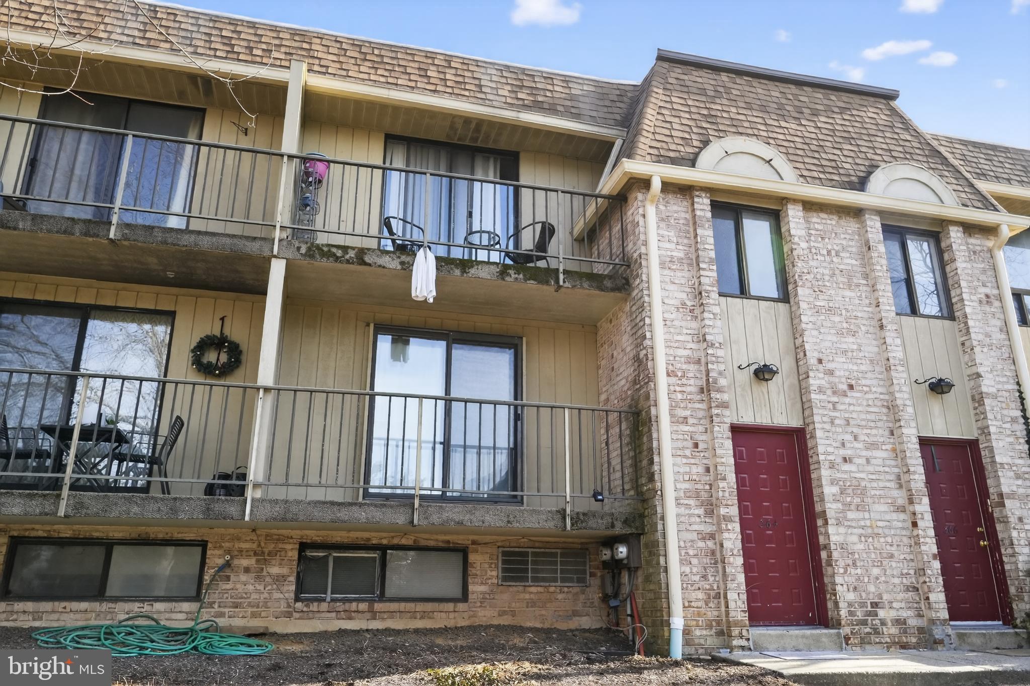 Charming multi-unit residence with balconies.