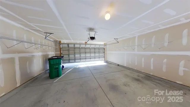 a view of a livingroom with a ceiling fan and window