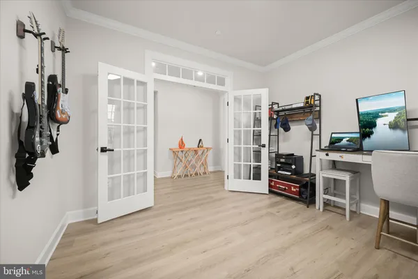 a view of a chair and tables in the patio