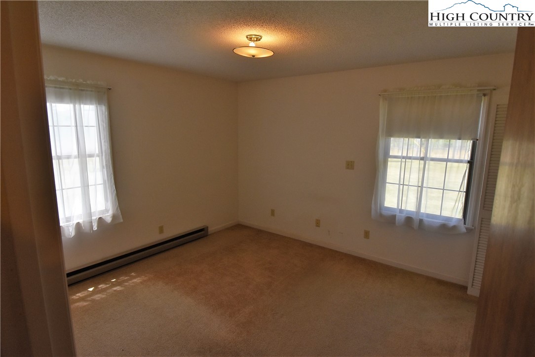 114 Dolinger Road Whitetop, VA 24292 - Photo 16 of 28 an empty room with a window