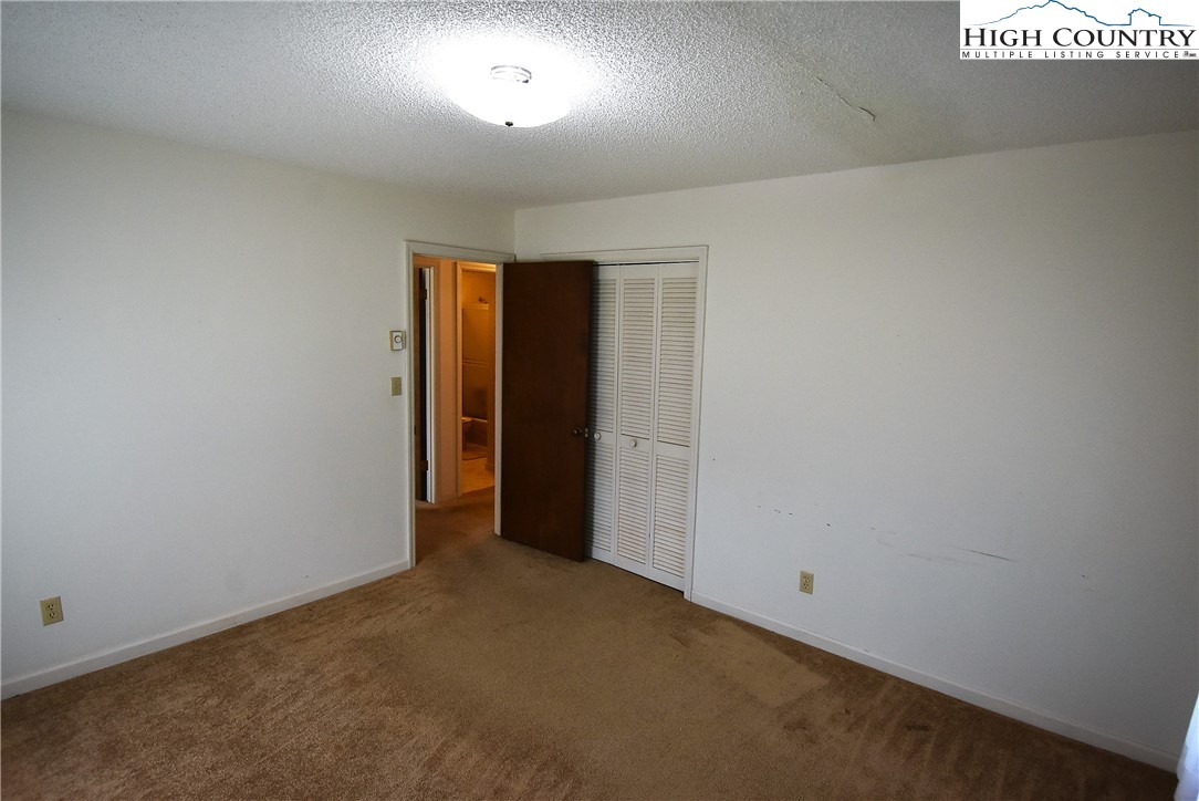 114 Dolinger Road Whitetop, VA 24292 - Photo 17 of 28 an empty room with an entryway