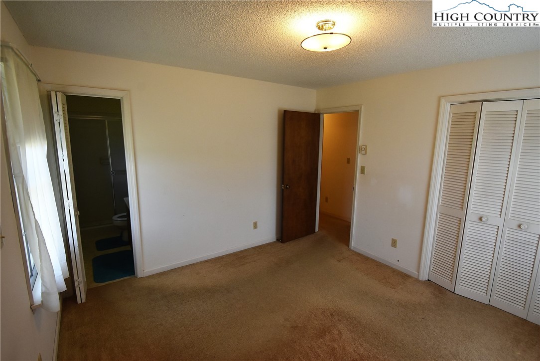114 Dolinger Road Whitetop, VA 24292 - Photo 18 of 28 an empty room with closet area