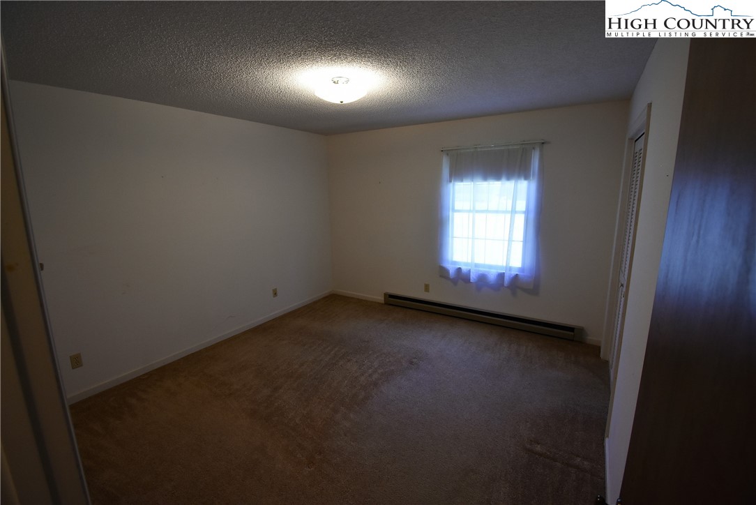 114 Dolinger Road Whitetop, VA 24292 - Photo 21 of 28 an empty room with a window