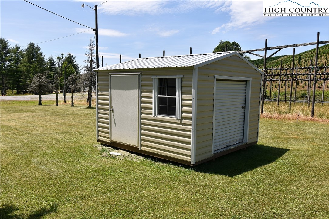 114 Dolinger Road Whitetop, VA 24292 - Photo 25 of 28 a front view of a house with a yard