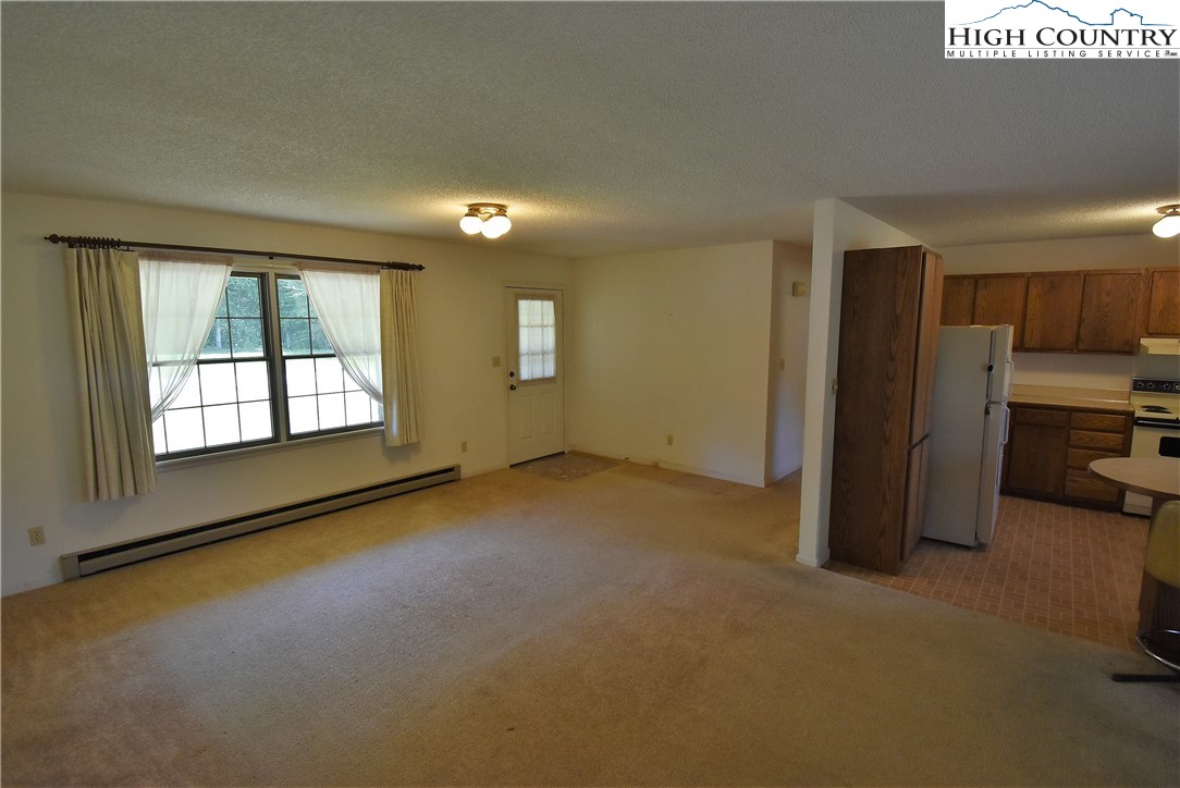 114 Dolinger Road Whitetop, VA 24292 - Photo 7 of 28 a view of an empty room with a window
