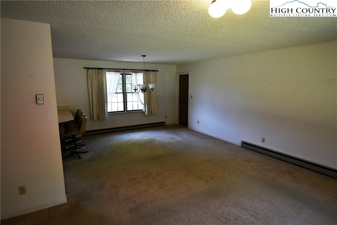 114 Dolinger Road Whitetop, VA 24292 - Photo 8 of 28 an empty room with a window