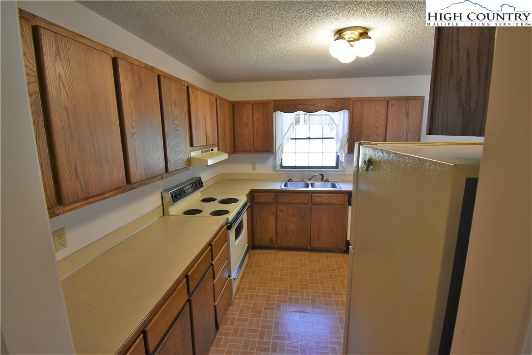 114 Dolinger Road Whitetop, VA 24292 - Photo 10 of 28 a room with storage and utility