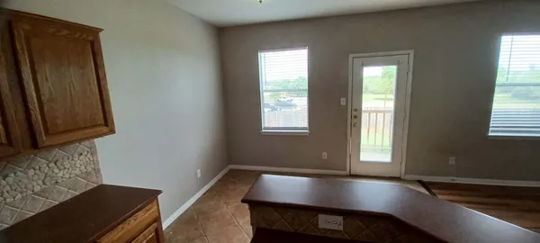 a view of livingroom with hardwood floor and hallway