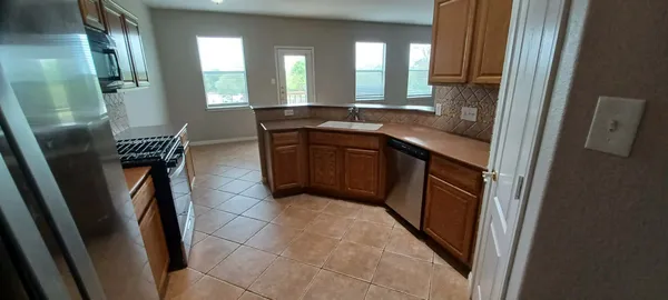 a bathroom with a mirror and a sink