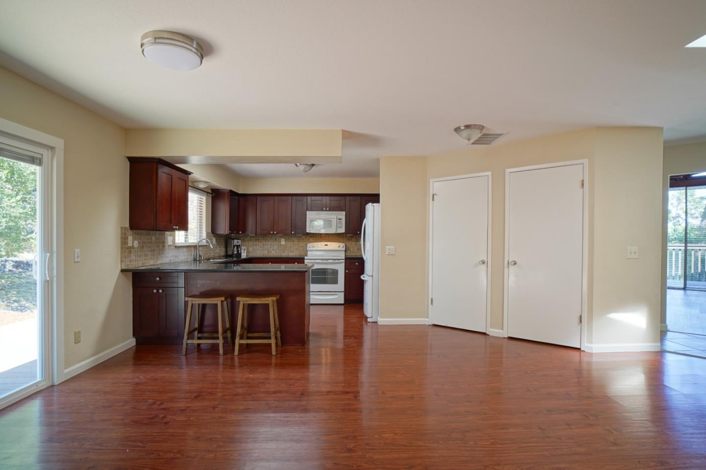 4059 Crest Road Pebble Beach, CA 93953 - Photo 14 of 27 a view of kitchen with cabinets and wooden floor