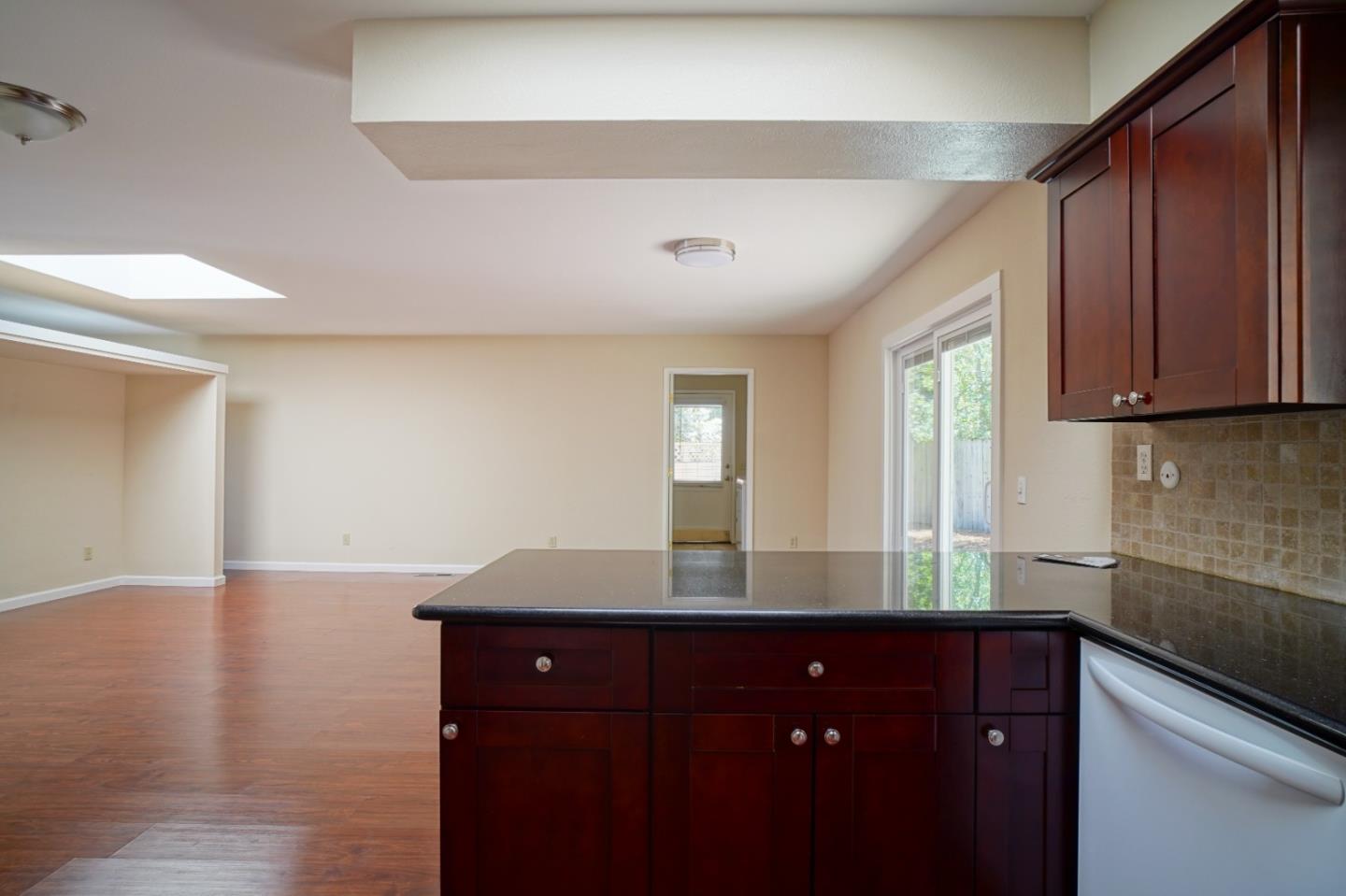 4059 Crest Road Pebble Beach, CA 93953 - Photo 18 of 27 a kitchen with sink and cabinets