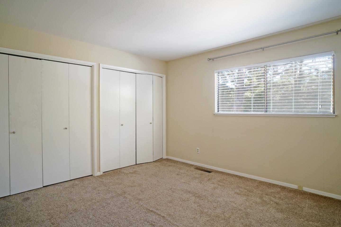 4059 Crest Road Pebble Beach, CA 93953 - Photo 23 of 27 a view of an empty room with a window