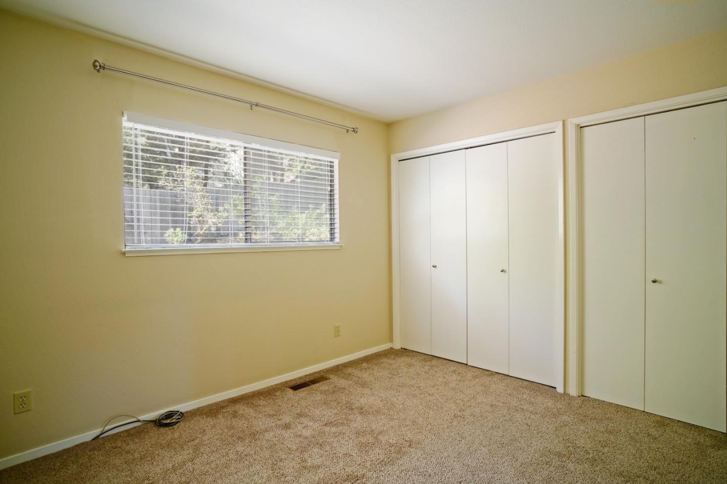 4059 Crest Road Pebble Beach, CA 93953 - Photo 24 of 27 a view of an empty room with a window