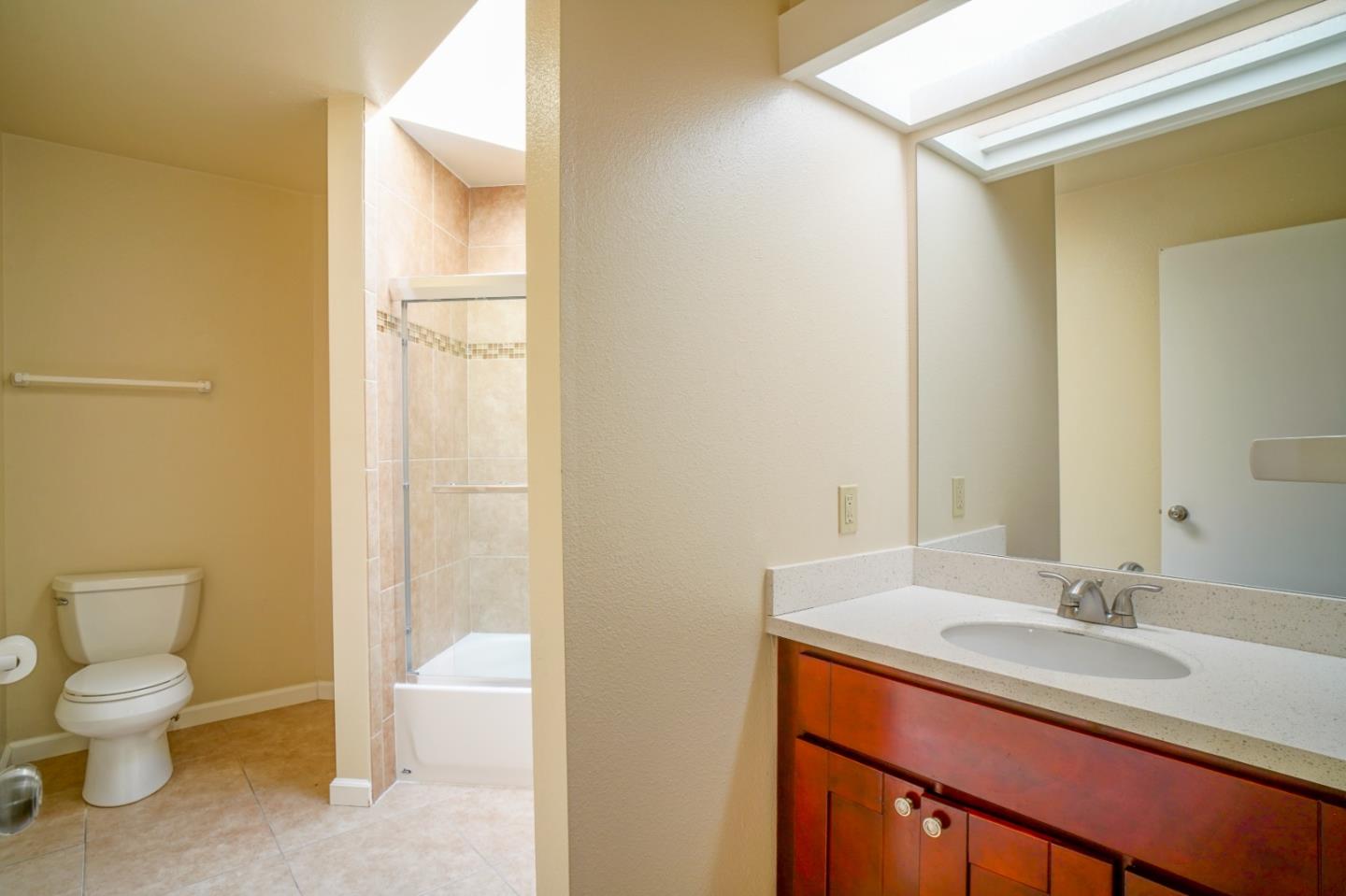 4059 Crest Road Pebble Beach, CA 93953 - Photo 26 of 27 a bathroom with a sink a toilet and shower