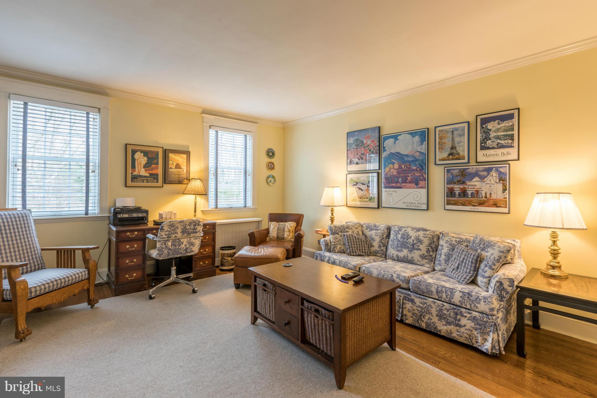 301 Tuscany Road Baltimore, MD 21210 - Photo 22 of 30 a living room with furniture and a couch