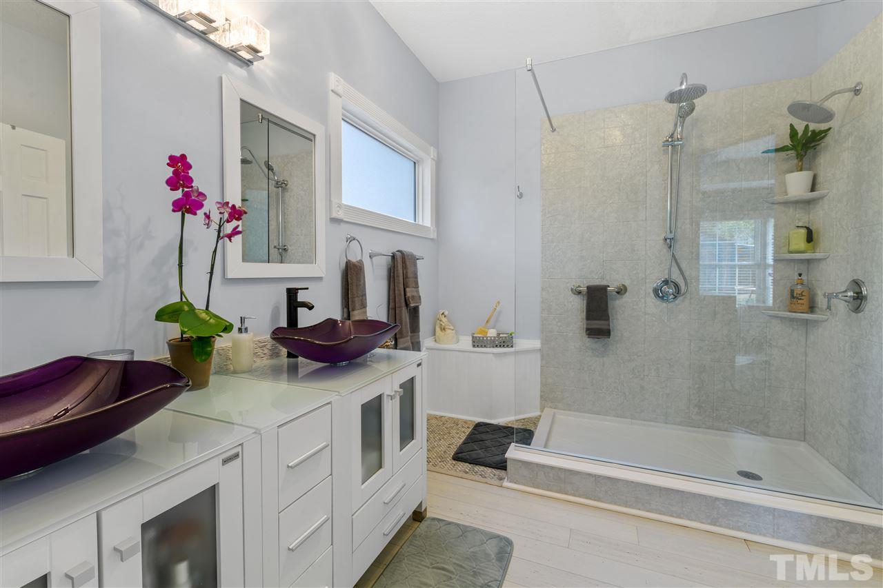 7601 Overland Trail Raleigh, NC 27615 - Photo 15 of 30 Updated master bath with walk in shower