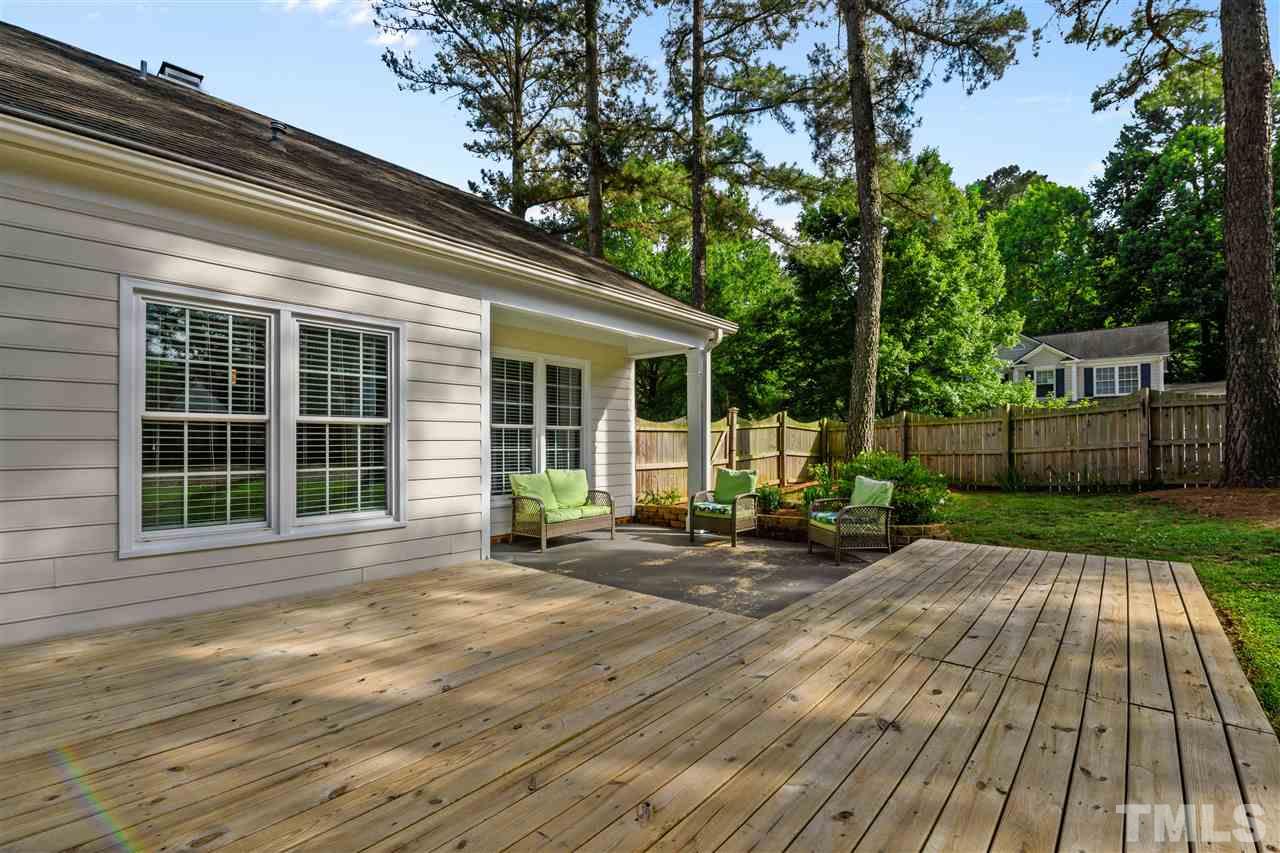 7601 Overland Trail Raleigh, NC 27615 - Photo 25 of 30 Covered back porch, patio and deck are great for entertaining