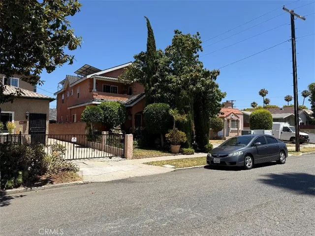 a view of car parked in front of house