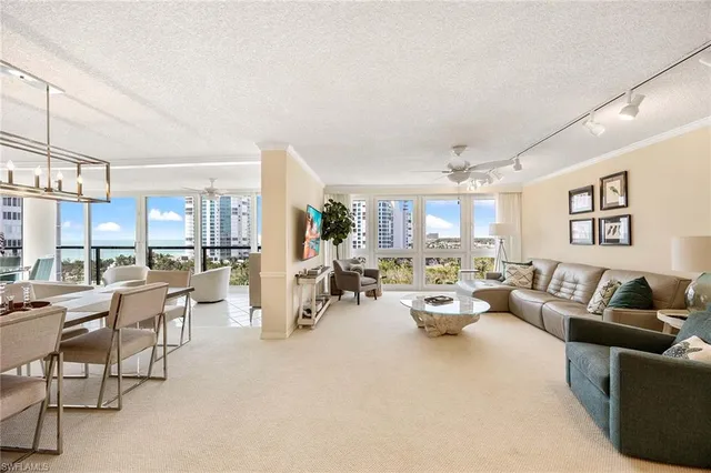 a living room with furniture and a view of living room